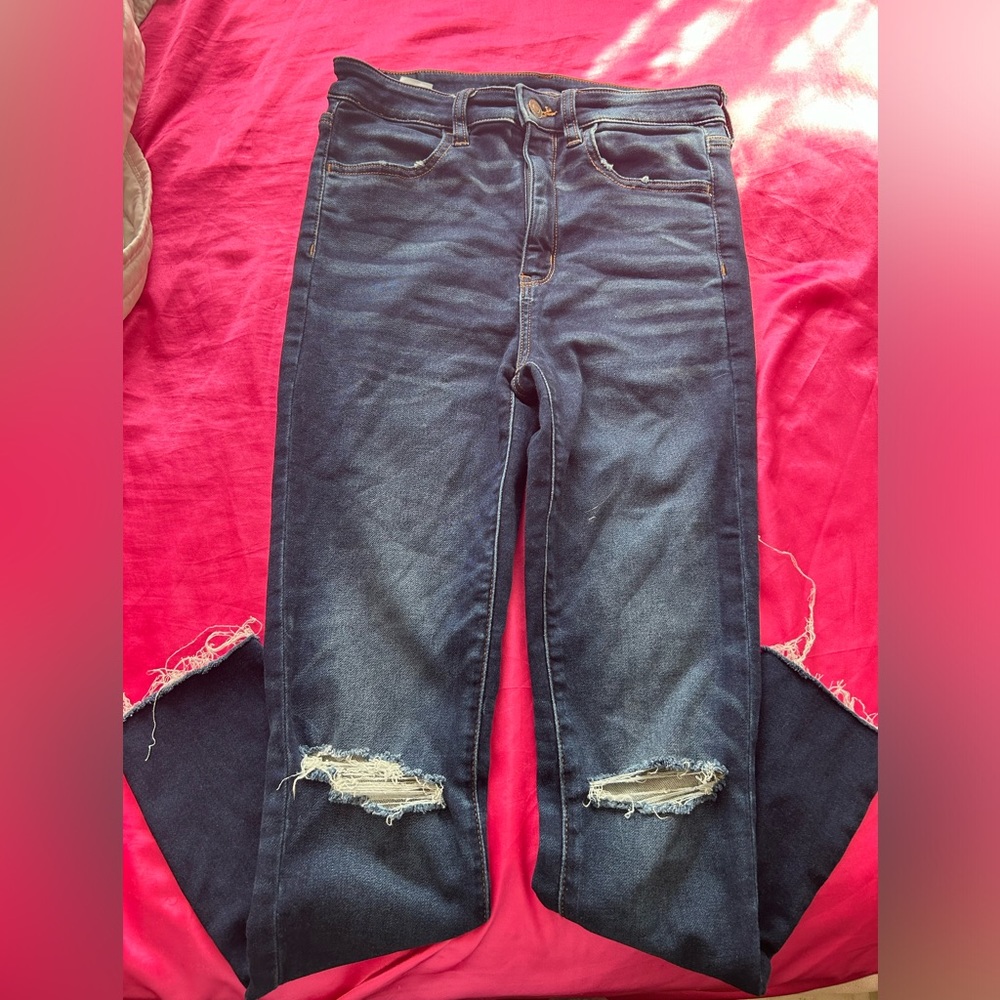 American eagle skinny jeans with rips on knees, very stretchy.